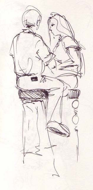 couple flirting at bar