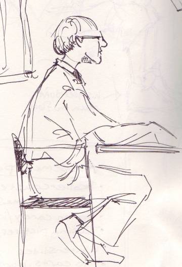 man at table gesture